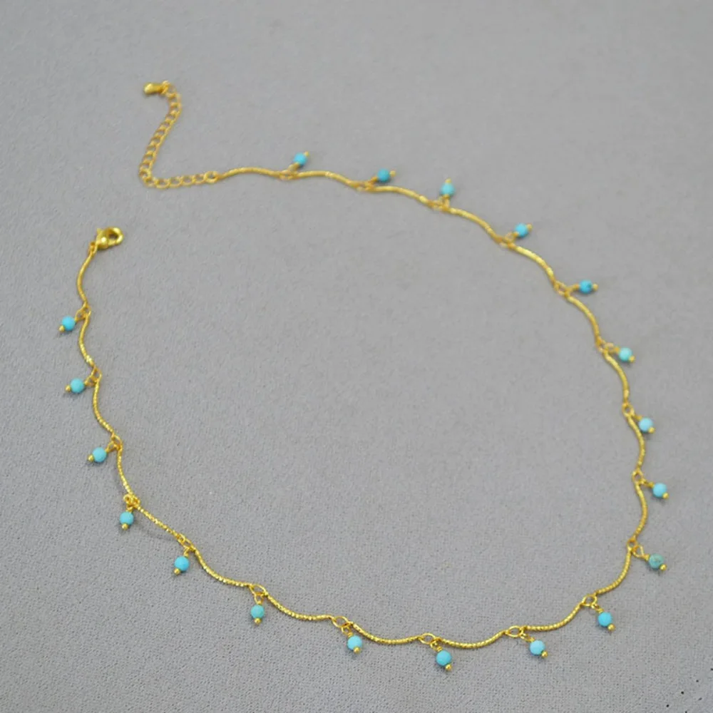 Niche Retro Literary Holiday Style Shiny Engraved Wire Brass Gold-plated Turquoise Faceted Round Bead Tassels Thin Necklace
Niche Retro Literary Holiday Style Shiny Engraved Wire Brass Gold-plated Turquoise Faceted Round Bead Tassels Thin Necklace