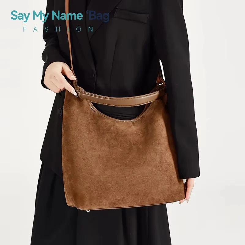 Новинка 2025 года, замшевая кожаная винтажная сумка через плечо на одно плечо, просторная ручная сумка-тоут, женская дорожная сумка премиум-класса
Новинка 2025 года, замшевая кожаная винтажная сумка через плечо на одно плечо, просторная ручная сумка-тоут, женская дорожная сумка премиум-класса