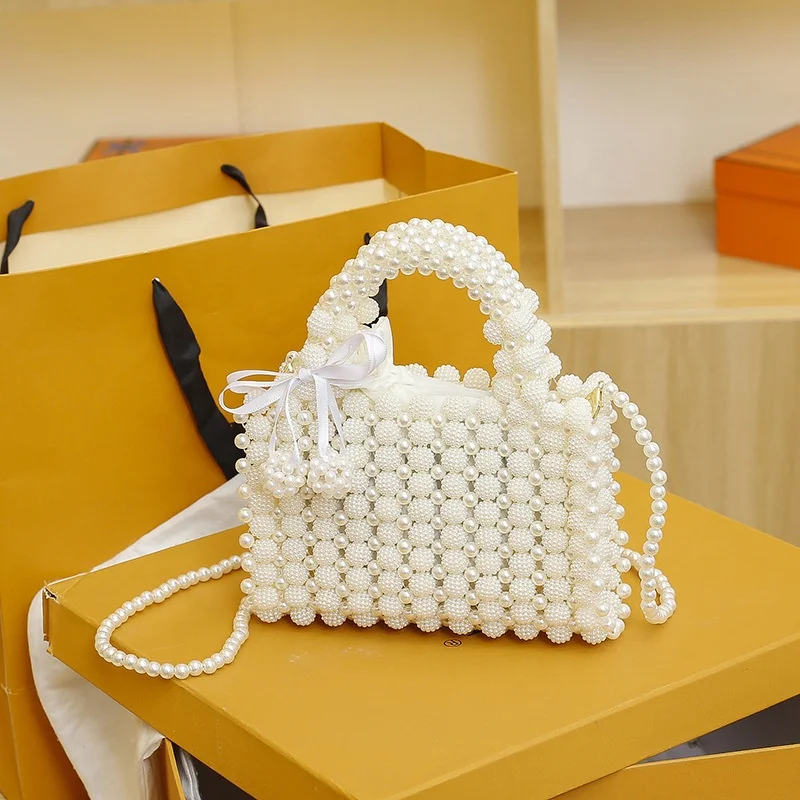 2025 Unique Hot Designer Ladies Acrylic Beaded Bag Chain Shoulder Mini Pearl Handle Handbag Women Wedding Bridal Party Gift Bags
2025 Unique Hot Designer Ladies Acrylic Beaded Bag Chain Shoulder Mini Pearl Handle Handbag Women Wedding Bridal Party Gift Bags