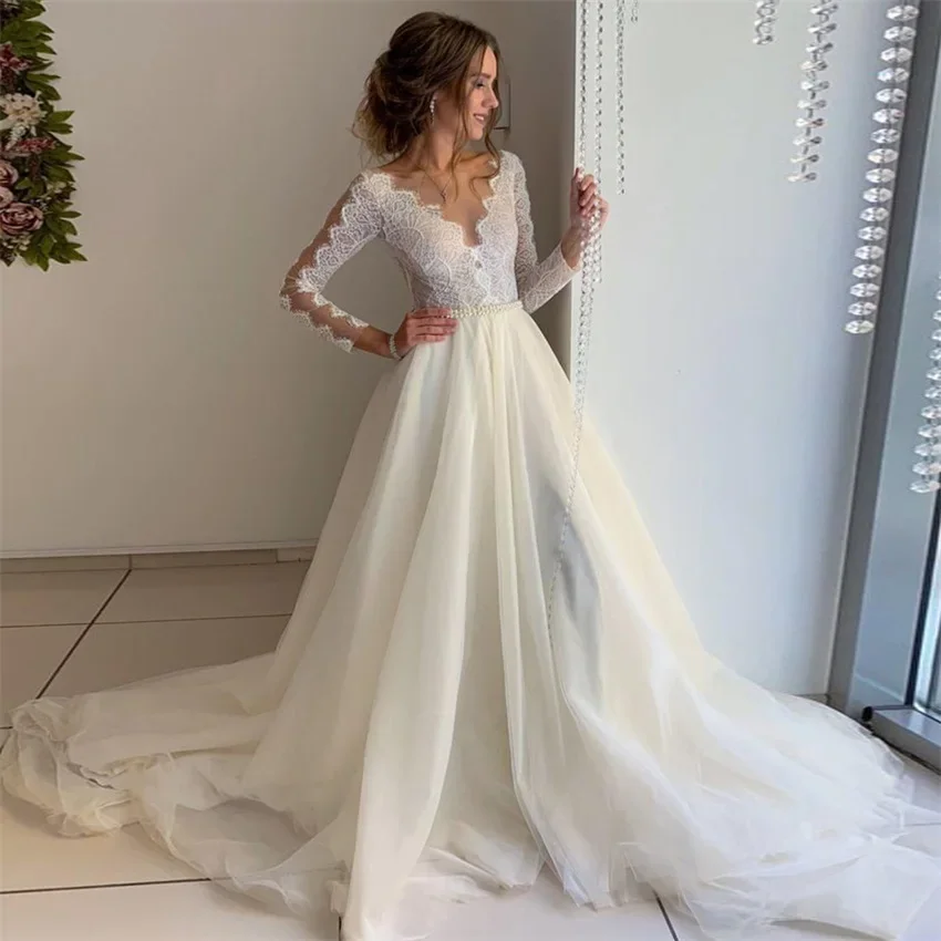 MYYBLE Cheap Bohemian Wedding Dress Sexy See Through Top Lace A Line Bridal Gowns Full Sleeves Floor Length with Buttons Back 
MYYBLE Cheap Bohemian Wedding Dress Sexy See Through Top Lace A Line Bridal Gowns Full Sleeves Floor Length with Buttons Back