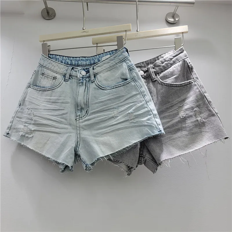 2026 Summer Retro Light Color Hole Denim Shorts Women Versatile Slimming Frayed A Line Wide Leg Spicy Girl Hot Pants
2026 Summer Retro Light Color Hole Denim Shorts Women Versatile Slimming Frayed A Line Wide Leg Spicy Girl Hot Pants