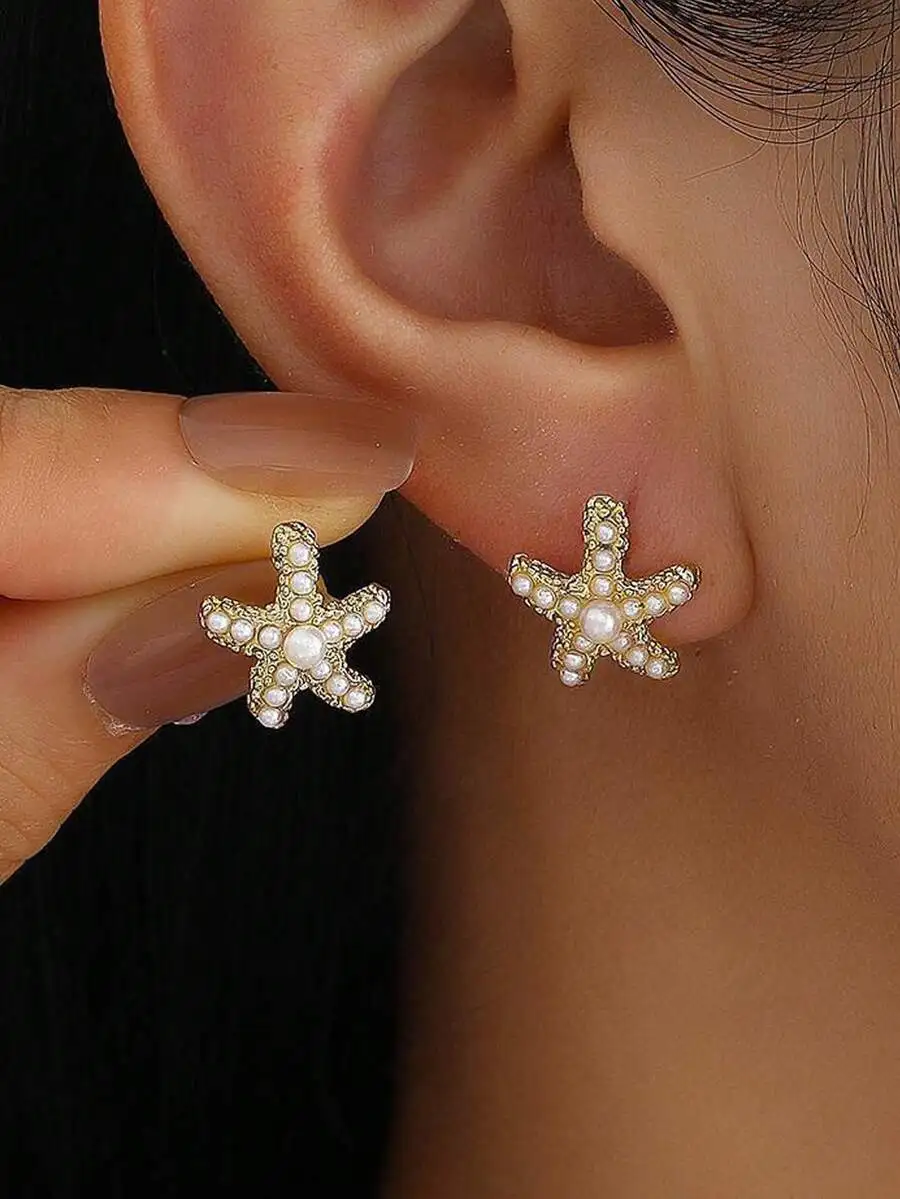 1 pair women's seaside beach style starfish faux pearl stud earrings ideal for travel outfits
1 pair women's seaside beach style starfish faux pearl stud earrings ideal for travel outfits