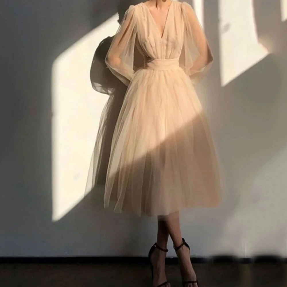 Champagne Tulle Prom Dresses 2022 V-Neck Sheer Long Sleeve Simple Evening Party Gowns Tea-Length Elegant Vestidos De Fiesta
Champagne Tulle Prom Dresses 2022 V-Neck Sheer Long Sleeve Simple Evening Party Gowns Tea-Length Elegant Vestidos De Fiesta