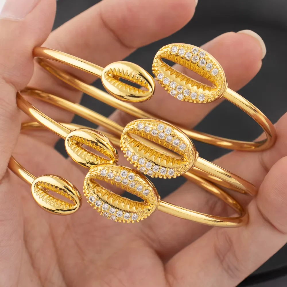 Gold Color Cuff Bangle Set for Nigeria Women Zircon Charm Bangle Shell Shape Hand Bracelet Jewelry Set Accessories wholesale
Gold Color Cuff Bangle Set for Nigeria Women Zircon Charm Bangle Shell Shape Hand Bracelet Jewelry Set Accessories wholesale