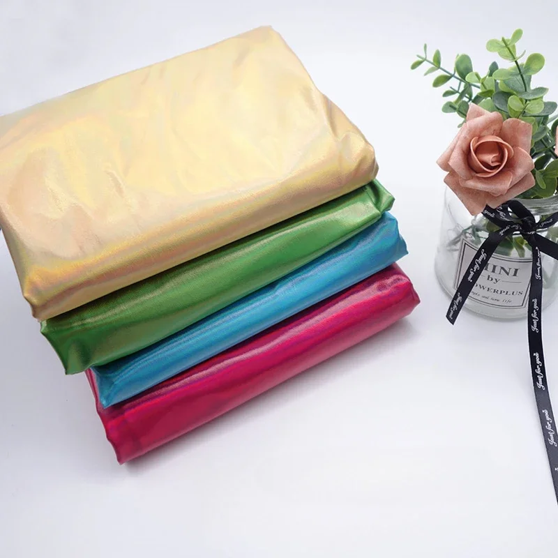 Эластичная лазерная переливающаяся ткань, ослепительная сценическая одежда, ткань с горячим тиснением, фоновая ткань, украшение, оптовая продажа
Эластичная лазерная переливающаяся ткань, ослепительная сценическая одежда, ткань с горячим тиснением, фоновая ткань, украшение, оптовая продажа