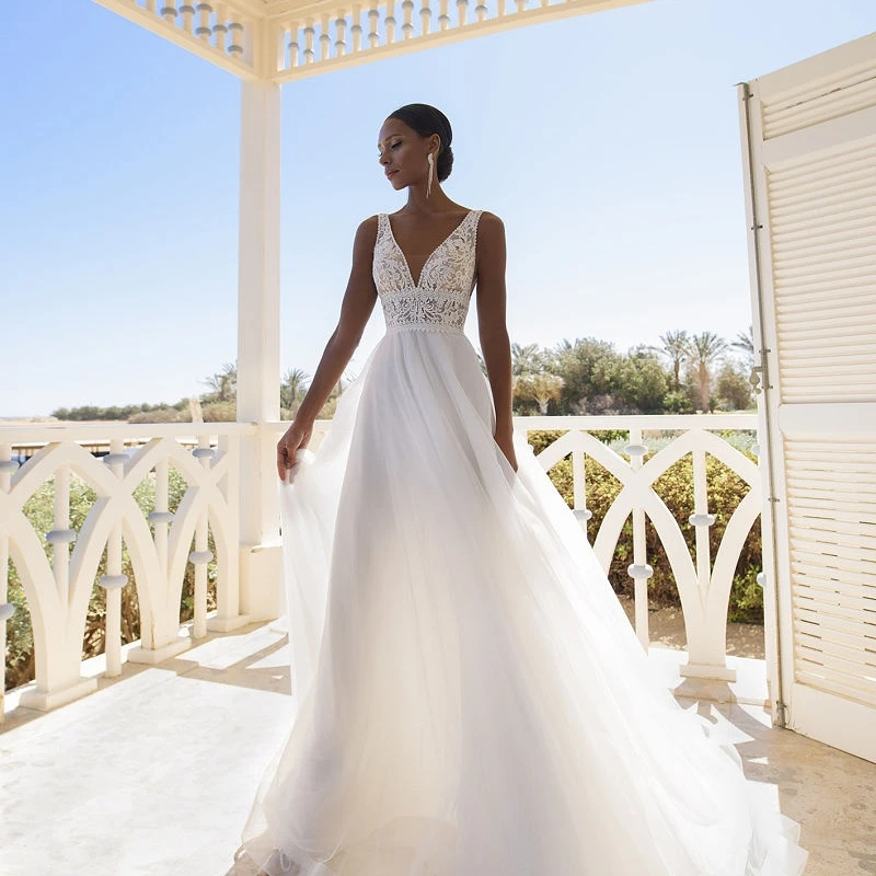 2023 Summer Boho A Line Tulle Appliques Wedding Dress V Neck Sleeveless Button Back Simple Robe De Mariee
2023 Summer Boho A Line Tulle Appliques Wedding Dress V Neck Sleeveless Button Back Simple Robe De Mariee