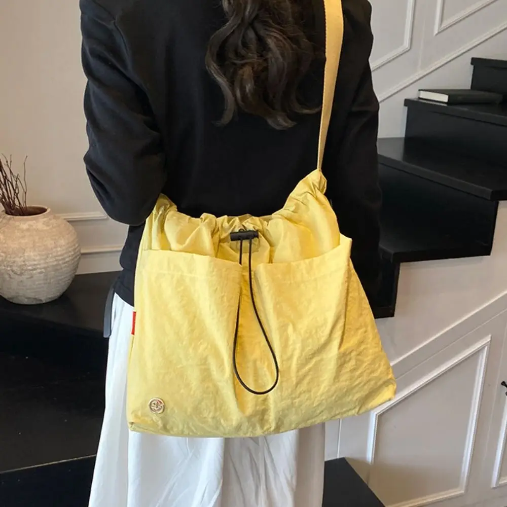 Korean Style Pleated Drawstring Bucket Bag Large Capacity Handbag Nylon Shoulder Bag Solid Color Waterproof Cloth Crossbody Bag
Korean Style Pleated Drawstring Bucket Bag Large Capacity Handbag Nylon Shoulder Bag Solid Color Waterproof Cloth Crossbody Bag