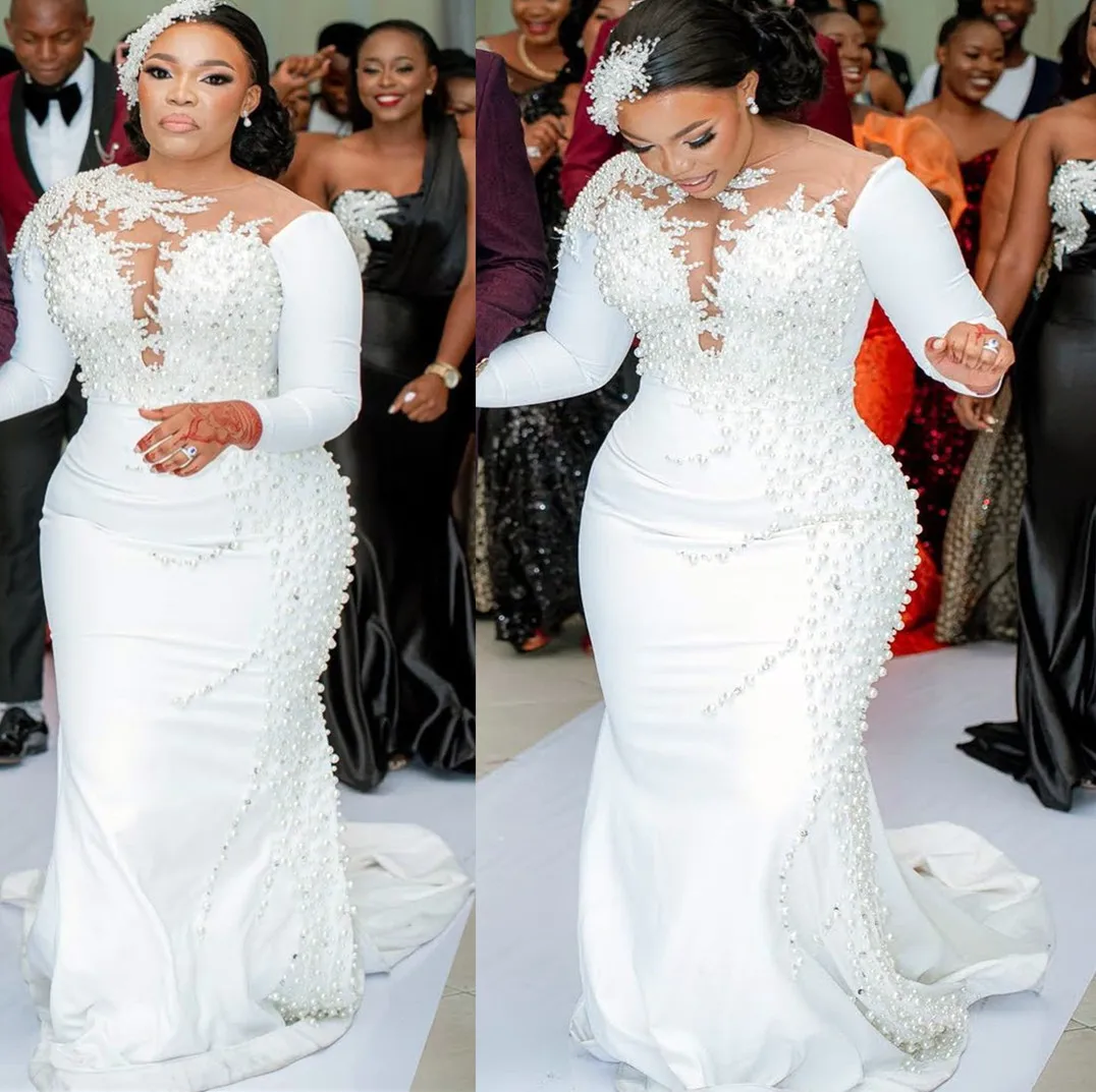 Customized Modern O-Neck Heavy Pearls Wedding Dresses With Overskirt Satin Long Sleeves Plus Size Robe De Mariée Bridal Gowns
Customized Modern O-Neck Heavy Pearls Wedding Dresses With Overskirt Satin Long Sleeves Plus Size Robe De Mariée Bridal Gowns