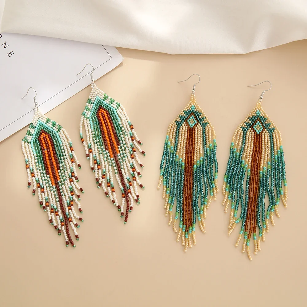 Beaded earrings Tassel Originality Geometry Design Gradient Hand knitting Bohemia Alloy Tide Simple Rice bead earrings
Beaded earrings Tassel Originality Geometry Design Gradient Hand knitting Bohemia Alloy Tide Simple Rice bead earrings