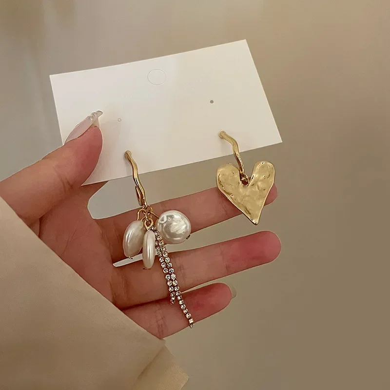 Trending Baroque Heart Tassel Drop Earrings New Design Fashion Asymmetric Imitation Pearl DangleEarring for Woman Party Jewelry
Trending Baroque Heart Tassel Drop Earrings New Design Fashion Asymmetric Imitation Pearl DangleEarring for Woman Party Jewelry