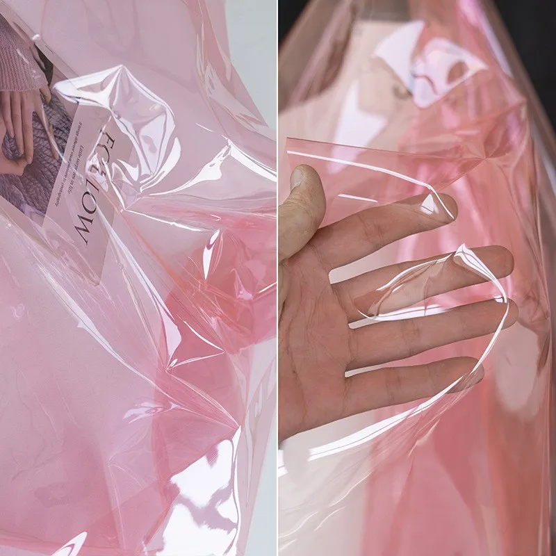 Light pink high-gloss high-transparency colored windbreaker film stiff-shaped clothing fabric
Light pink high-gloss high-transparency colored windbreaker film stiff-shaped clothing fabric