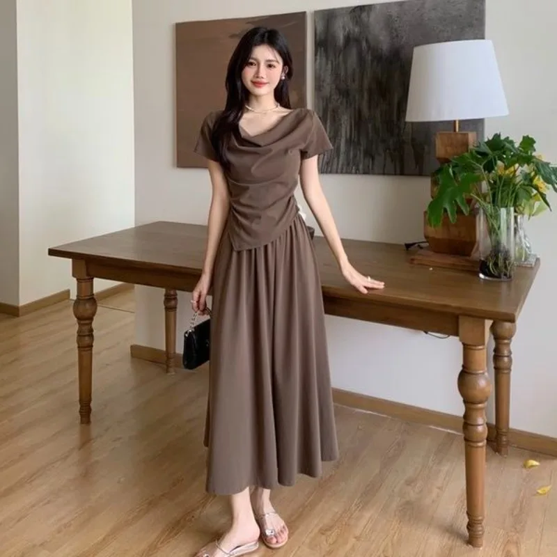 Women Casual Fashion Asymmetrical Short T Shirts Midi Skirts Two Piece Set 2025 Summer New Lady Solid Joker Tops Skirt Outfits
Women Casual Fashion Asymmetrical Short T Shirts Midi Skirts Two Piece Set 2025 Summer New Lady Solid Joker Tops Skirt Outfits
