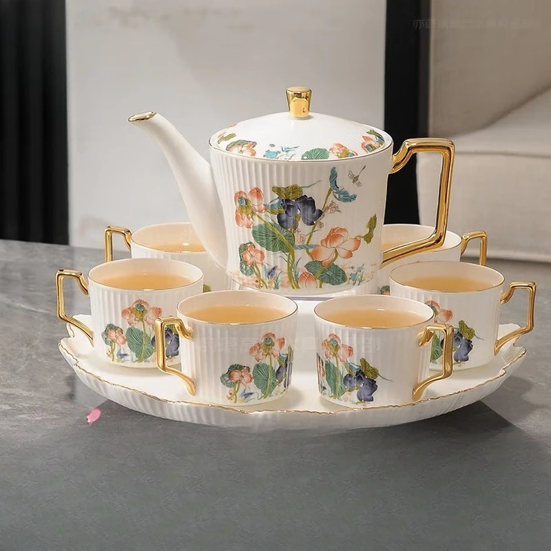 Living room light luxury high-end teapot teacup complete set of gift box cup set, lotus pond spring water set eight-piece set
Living room light luxury high-end teapot teacup complete set of gift box cup set, lotus pond spring water set eight-piece set