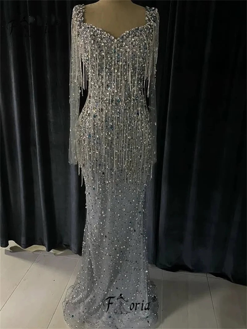 Couture Серебряные бусины с хрустальными камнями Вечерние платья для вечеринок 2025 Дубай Длинные платья ручной работы с кисточками для выпускного вечера Индивидуальные платья
Couture Серебряные бусины с хрустальными камнями Вечерние платья для вечеринок 2025 Дубай Длинные платья ручной работы с кисточками для выпускного вечера Индивидуальные платья