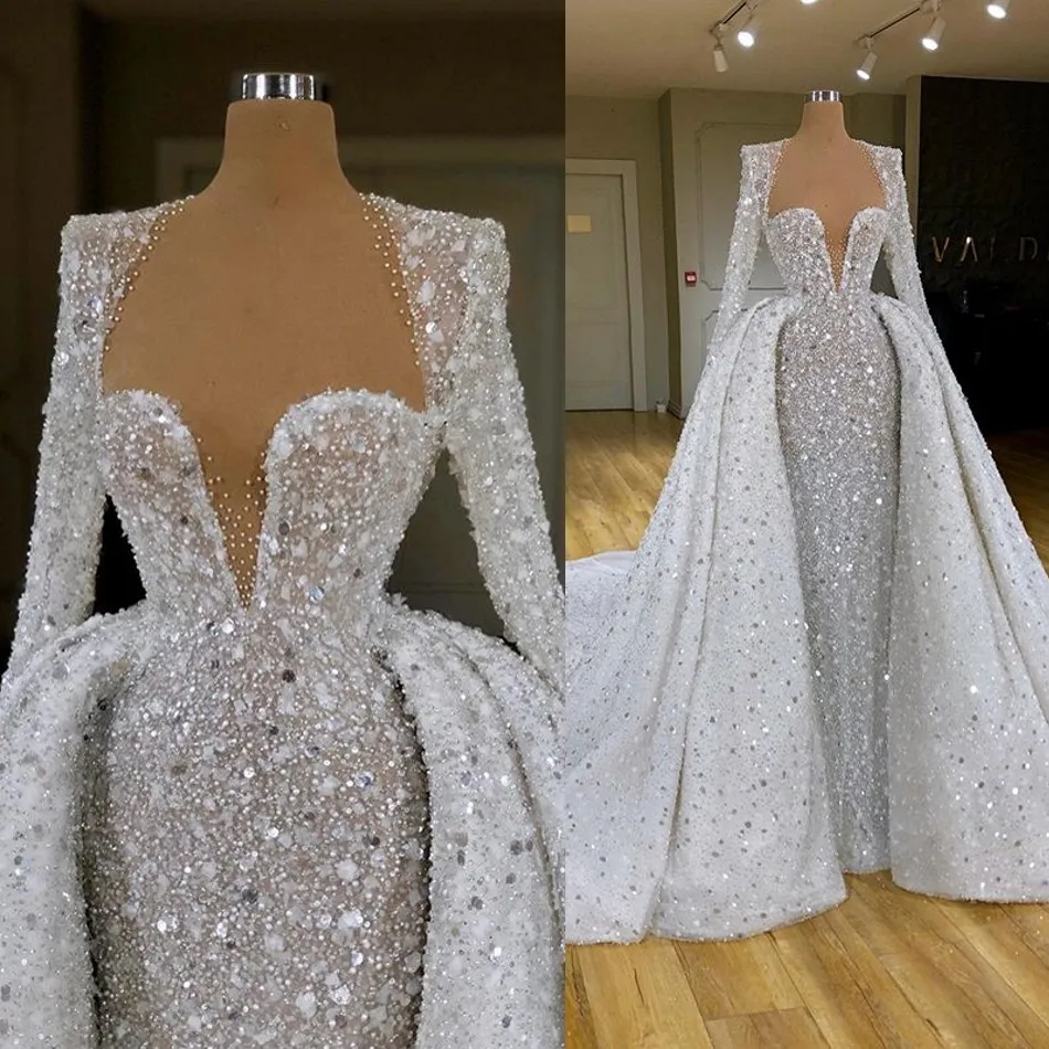 New Arrival SParkly Crystals Beads Wedding Dress with Detachable Train Robe De Mariée Bridal Gowns with Long Sleeves Jacket
New Arrival SParkly Crystals Beads Wedding Dress with Detachable Train Robe De Mariée Bridal Gowns with Long Sleeves Jacket