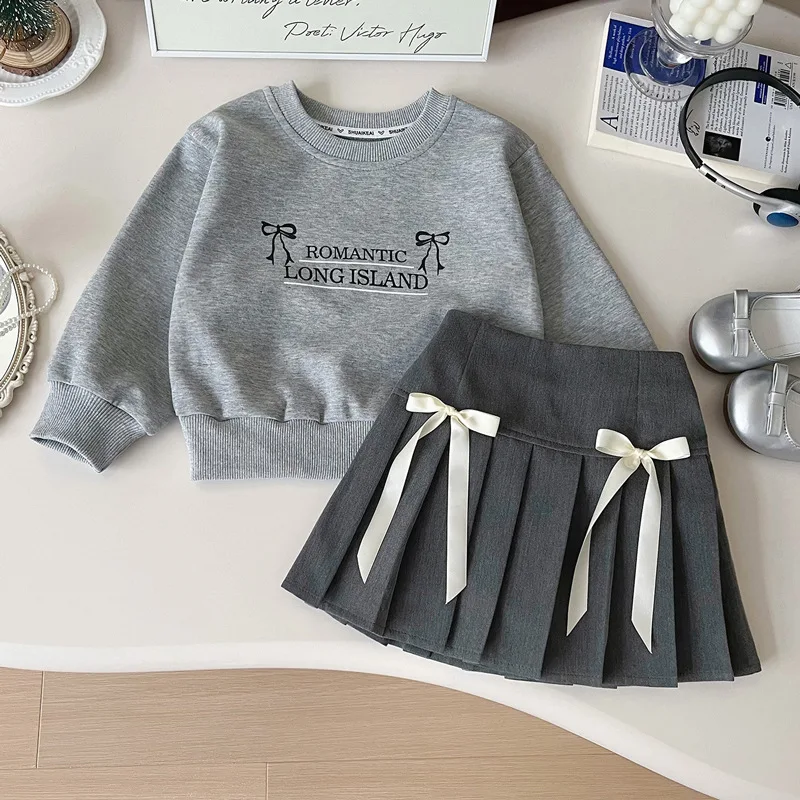 Small and medium children's bow sweater set skirt 2025 spring new children's spring and autumn top pleated skirt two-piece set t
Small and medium children's bow sweater set skirt 2025 spring new children's spring and autumn top pleated skirt two-piece set t