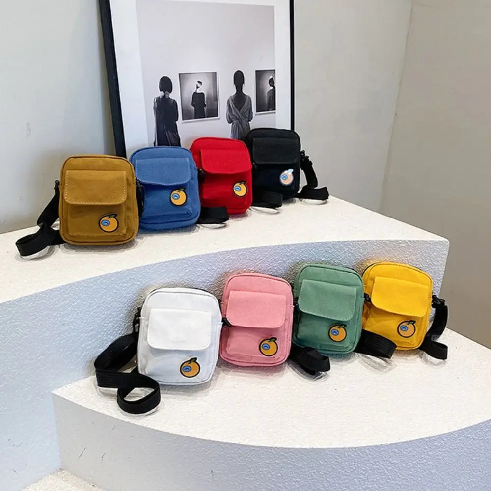 Casual Solid Color Mini Crossbody Bag Lightweight Handbag Nylon Zipper Bag Casual Purse Canvas Phone Bag Girls/boys
Casual Solid Color Mini Crossbody Bag Lightweight Handbag Nylon Zipper Bag Casual Purse Canvas Phone Bag Girls/boys