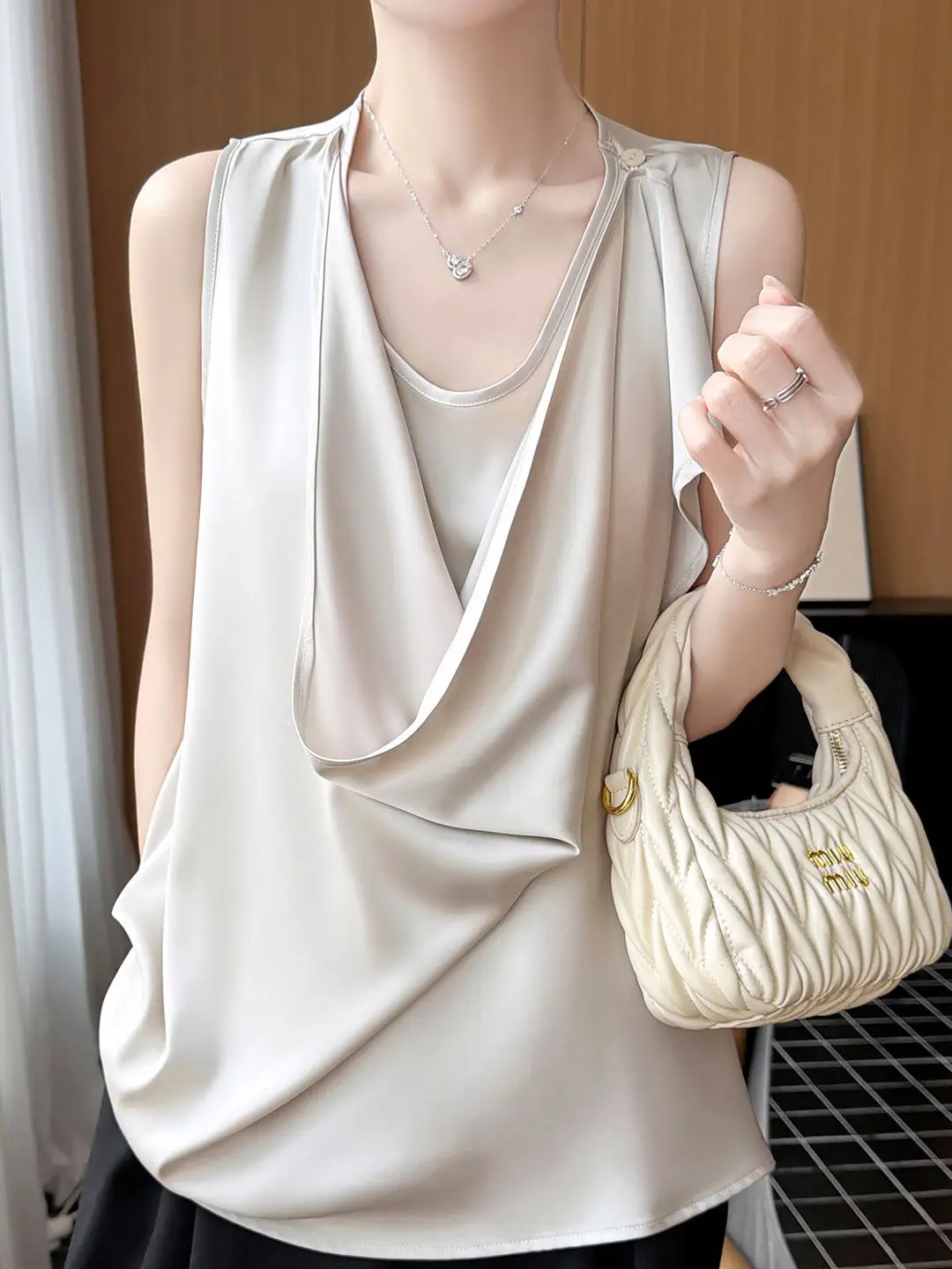 Elegant Satin Sleeveless Shirt Women's Fashion Asymmetrical Neckline Draped Ribbon Top Mid-Length Casual Trendy T-Shirt
Elegant Satin Sleeveless Shirt Women's Fashion Asymmetrical Neckline Draped Ribbon Top Mid-Length Casual Trendy T-Shirt