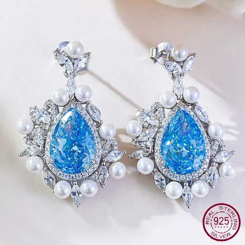 New S925 Silver Imported Ice Flower Cut 8 * 12 Water Drop Sea Blue Earrings for Women's Fashion Colorful Treasure Earrings
New S925 Silver Imported Ice Flower Cut 8 * 12 Water Drop Sea Blue Earrings for Women's Fashion Colorful Treasure Earrings