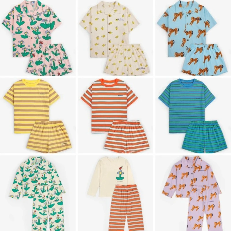 SS 26 BC Новые комплекты домашней одежды с мультяшным принтом Детские футболки с короткими рукавами Шорты Топ с длинными рукавами для мальчиков и девочек и длинные брюки
SS 26 BC Новые комплекты домашней одежды с мультяшным принтом Детские футболки с короткими рукавами Шорты Топ с длинными рукавами для мальчиков и девочек и длинные брюки