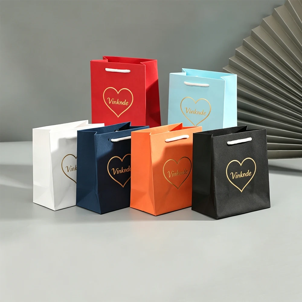 24/50/100Pcs Custom Logo 10*6*11.7cm Jewelry Paper Handle Bag Wedding Gift Organizer Handbag Earrings Key Cosmetic Oil Packaging
24/50/100Pcs Custom Logo 10*6*11.7cm Jewelry Paper Handle Bag Wedding Gift Organizer Handbag Earrings Key Cosmetic Oil Packaging