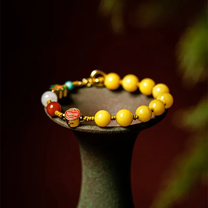 free shipping Yellow beeswax bracelet 8mm braided rope bracelet female Fu Lu blessing hand string Chinese wind Buddha transfer
free shipping Yellow beeswax bracelet 8mm braided rope bracelet female Fu Lu blessing hand string Chinese wind Buddha transfer