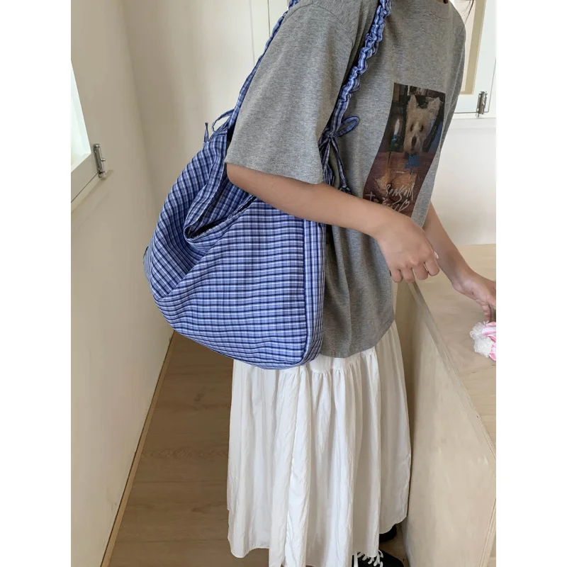 Plaid canvas bag for women2025New artistic styleinsKorean-style commuter bag, casual crossbody bag for students attending classe
Plaid canvas bag for women2025New artistic styleinsKorean-style commuter bag, casual crossbody bag for students attending classe