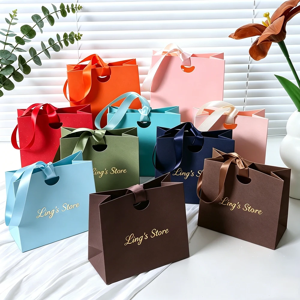 10/20/50/100Pcs 15.5x7.5x14.5cm Jewelry Paper Handle Bag Cosmetic Perfume Watches Keychain Sunglasses Tote Personalized Handbag
10/20/50/100Pcs 15.5x7.5x14.5cm Jewelry Paper Handle Bag Cosmetic Perfume Watches Keychain Sunglasses Tote Personalized Handbag