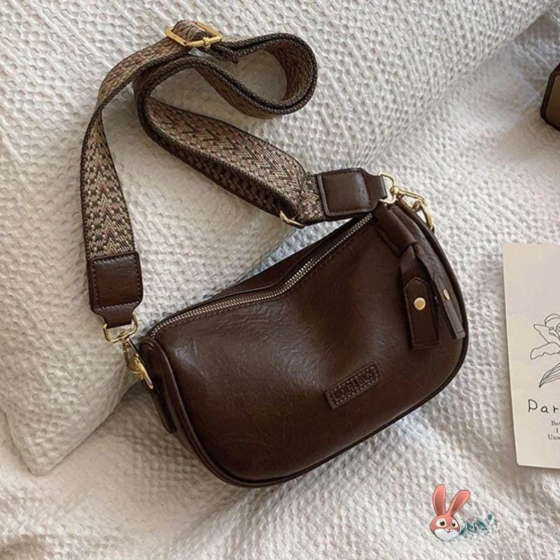 Модная сумка Boston Bag осенне-зимняя, винтажная, с широким ремнем, через плечо, в форме подушки, женская, универсальная, маленькая, в стиле хобо, из искусственной кожи.
Модная сумка Boston Bag осенне-зимняя, винтажная, с широким ремнем, через плечо, в форме подушки, женская, универсальная, маленькая, в стиле хобо, из искусственной кожи.