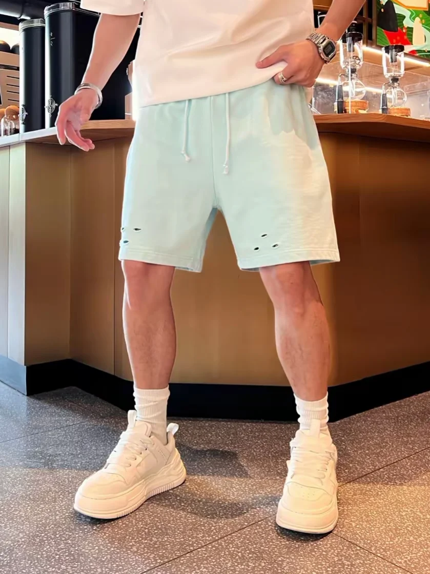 Summer Men's Fashion Macaron Color Hole Drawstring Shorts Casual Loose Fit mid Waist Cotton Blend Fabric Five-Quarter Length
Summer Men's Fashion Macaron Color Hole Drawstring Shorts Casual Loose Fit mid Waist Cotton Blend Fabric Five-Quarter Length