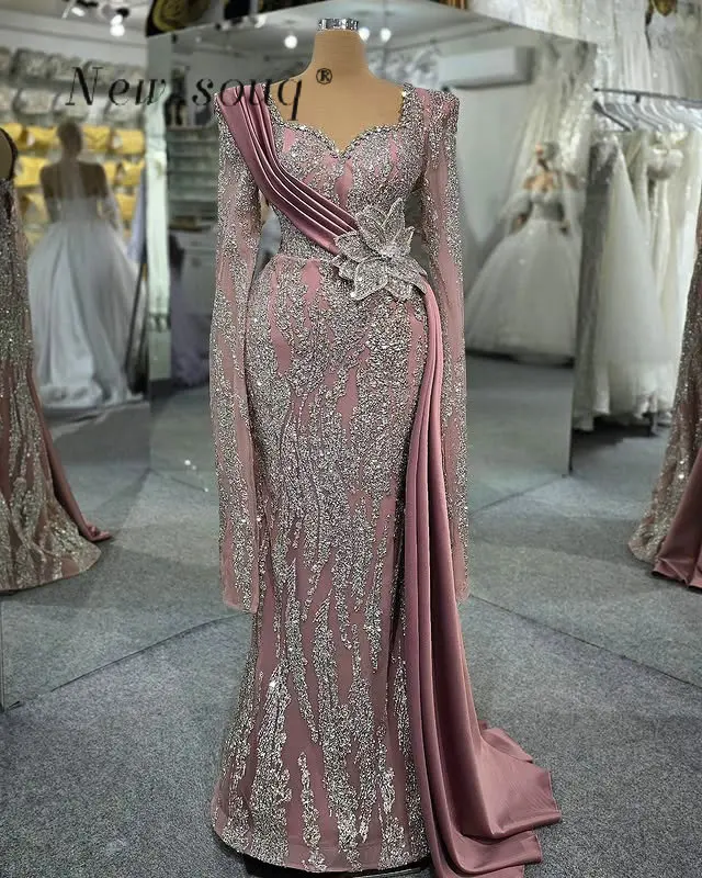 Индивидуальные арабские розовые длинные вечерние платья русалки с бисером и блестками, длинная накидка с рукавами, платья для выпускного вечера, вечерние платья для женщин
Индивидуальные арабские розовые длинные вечерние платья русалки с бисером и блестками, длинная накидка с рукавами, платья для выпускного вечера, вечерние платья для женщин