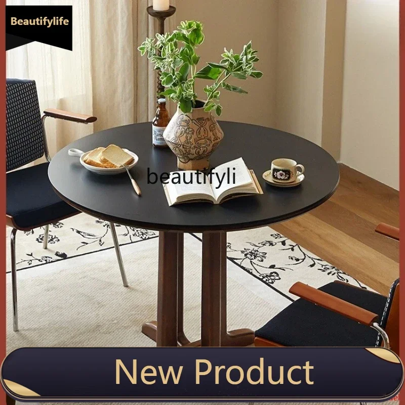 Solid wood black rock slab round table retro home restaurant round dining table and chair combination Nordic
Solid wood black rock slab round table retro home restaurant round dining table and chair combination Nordic