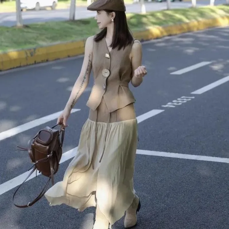 Women Korean Sleeveless Waistcoat Irregular Long Skirt Two Piece Set Summer Slim Outfit
Women Korean Sleeveless Waistcoat Irregular Long Skirt Two Piece Set Summer Slim Outfit