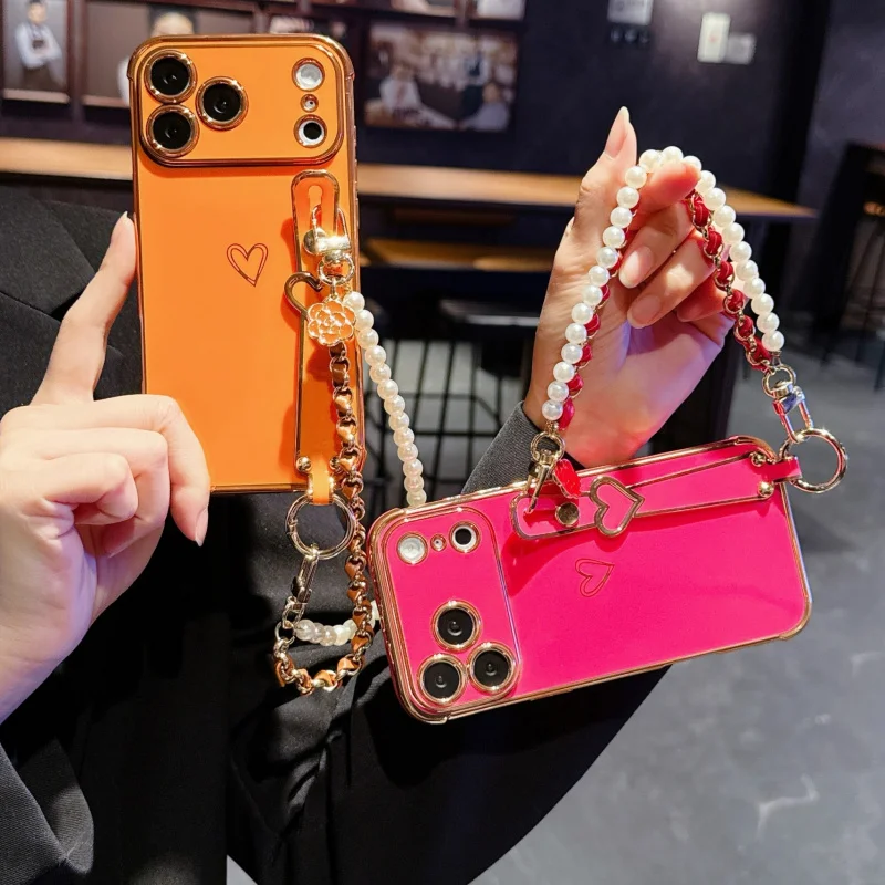 Electroplated Hollow Heart Wristband Stand for Apple Devices17PromaxHand chain phone case16/15/13PROSilicone Soft Shell
Electroplated Hollow Heart Wristband Stand for Apple Devices17PromaxHand chain phone case16/15/13PROSilicone Soft Shell