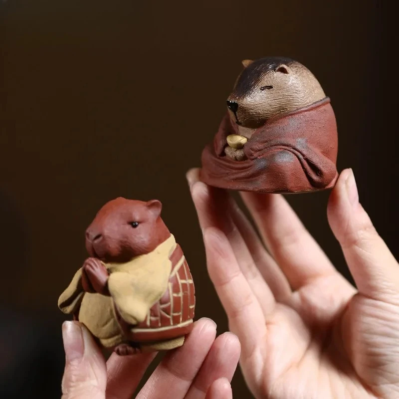 Cute Capibala Guinea Pig Yixing Purple Clay Animal Capybara Tea Pet Boutique Tea Spirit Figurine Play Toys Zisha Statue
Cute Capibala Guinea Pig Yixing Purple Clay Animal Capybara Tea Pet Boutique Tea Spirit Figurine Play Toys Zisha Statue