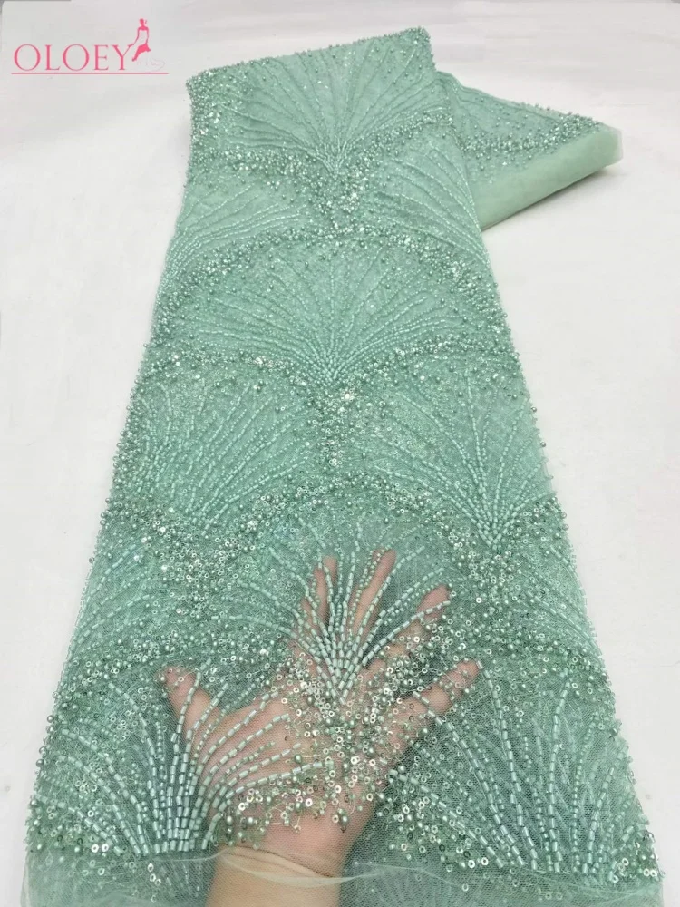 OLOEY High-End Hand Beaded Lace Fabric Bridal Gown Material Nigerian Sequins Beads Embroidered on Tulle for Wedding Dresses
OLOEY High-End Hand Beaded Lace Fabric Bridal Gown Material Nigerian Sequins Beads Embroidered on Tulle for Wedding Dresses