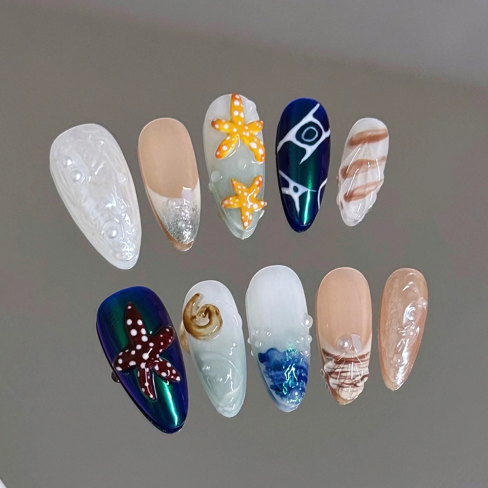 10pcs Blue Almond Handmade Fake Nails Summer Ocean Series Charming False Nails 3D Starfish Seashell French Tips Press On Nail
10pcs Blue Almond Handmade Fake Nails Summer Ocean Series Charming False Nails 3D Starfish Seashell French Tips Press On Nail