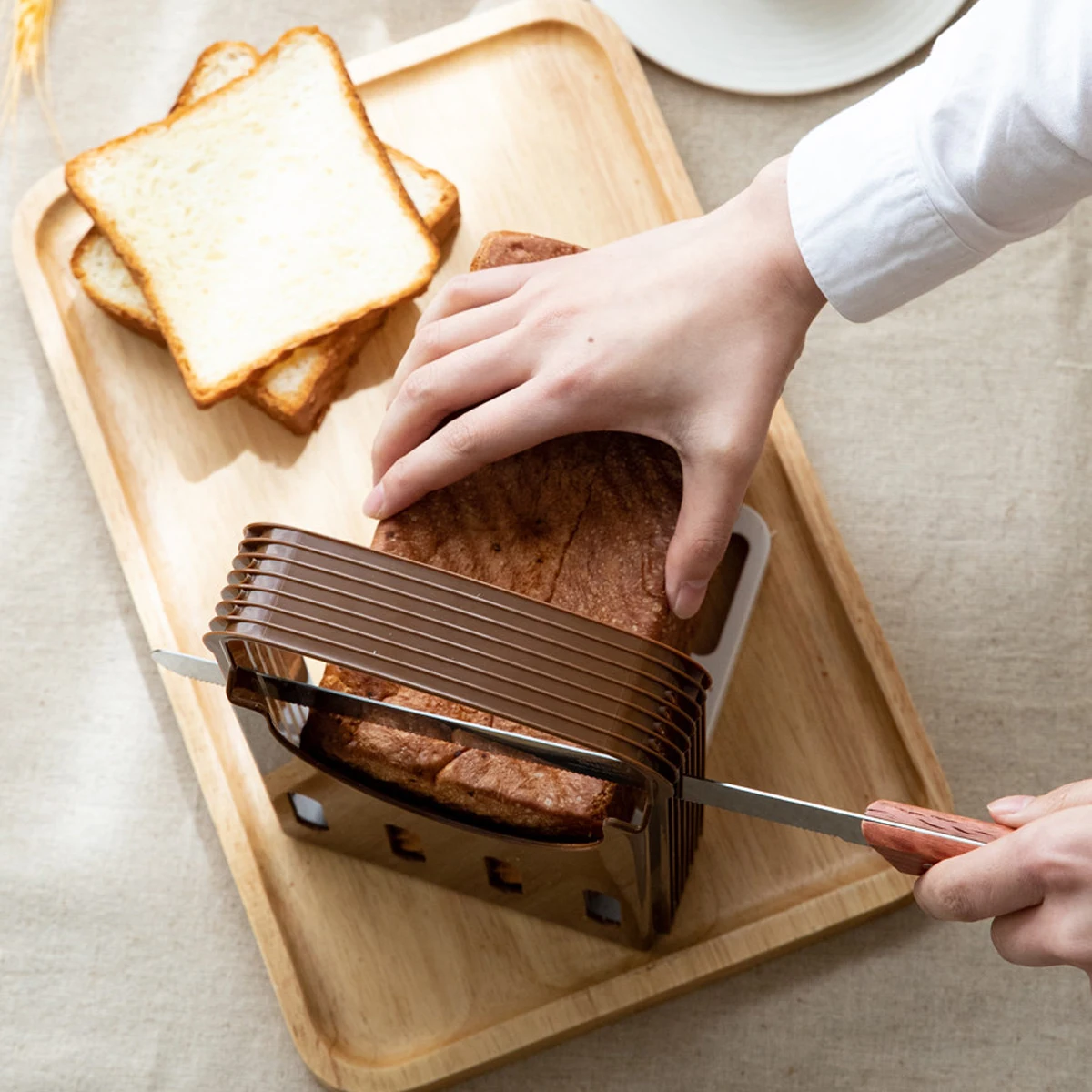 2026 New Toast Bread Slicer Stand Foldable Loaf Cutter Rack Baking Tool Cutting Guide Plastic Slicing Tool
2026 New Toast Bread Slicer Stand Foldable Loaf Cutter Rack Baking Tool Cutting Guide Plastic Slicing Tool