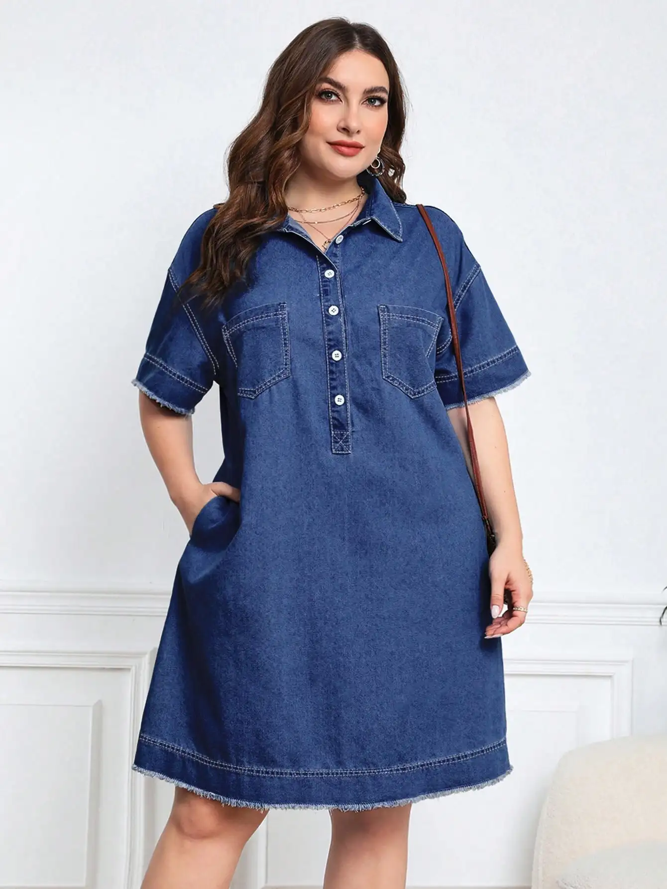 Plus Size Casual Button-Front Denim Midi Dress with Pocket and Frayed Hem
Plus Size Casual Button-Front Denim Midi Dress with Pocket and Frayed Hem