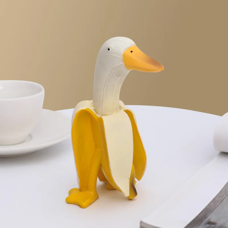 Resin Duck Peeled Bananas Toys Creative Desktop Decoration Sculptures Cute Duck Shape Statues Kids Cartoon Animal Ornaments
Resin Duck Peeled Bananas Toys Creative Desktop Decoration Sculptures Cute Duck Shape Statues Kids Cartoon Animal Ornaments
