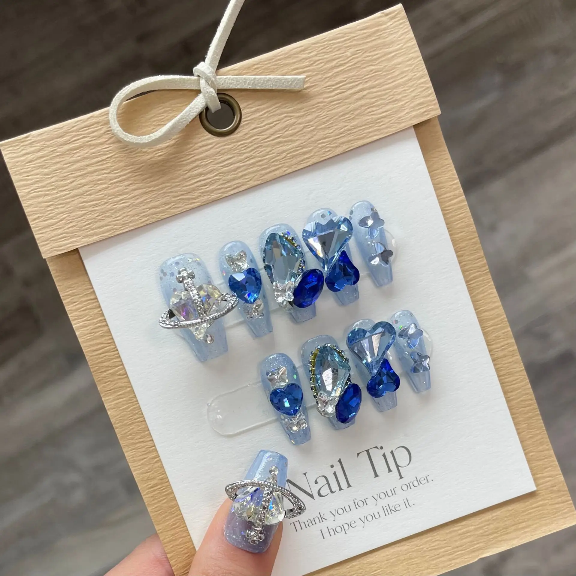 Handmade Y2K Nails Set Press on Long Luxury Blue Fake Nails with Glue Hand Paint Design Acrylic Full Cover Nail Tips for Girls
Handmade Y2K Nails Set Press on Long Luxury Blue Fake Nails with Glue Hand Paint Design Acrylic Full Cover Nail Tips for Girls