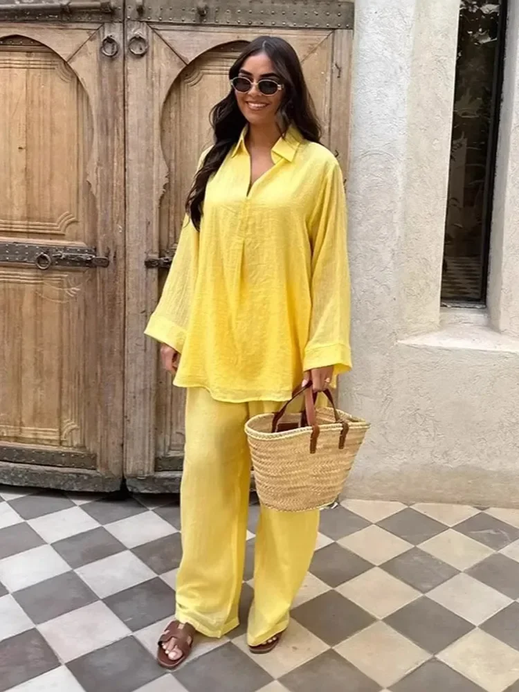 Повседневный однотонный костюм с v-образным вырезом и отложным воротником с длинными рукавами, новые женские широкие брюки, 2025 шикарные женские летние пляжные наряды для отдыха
Повседневный однотонный костюм с v-образным вырезом и отложным воротником с длинными рукавами, новые женские широкие брюки, 2025 шикарные женские летние пляжные наряды для отдыха