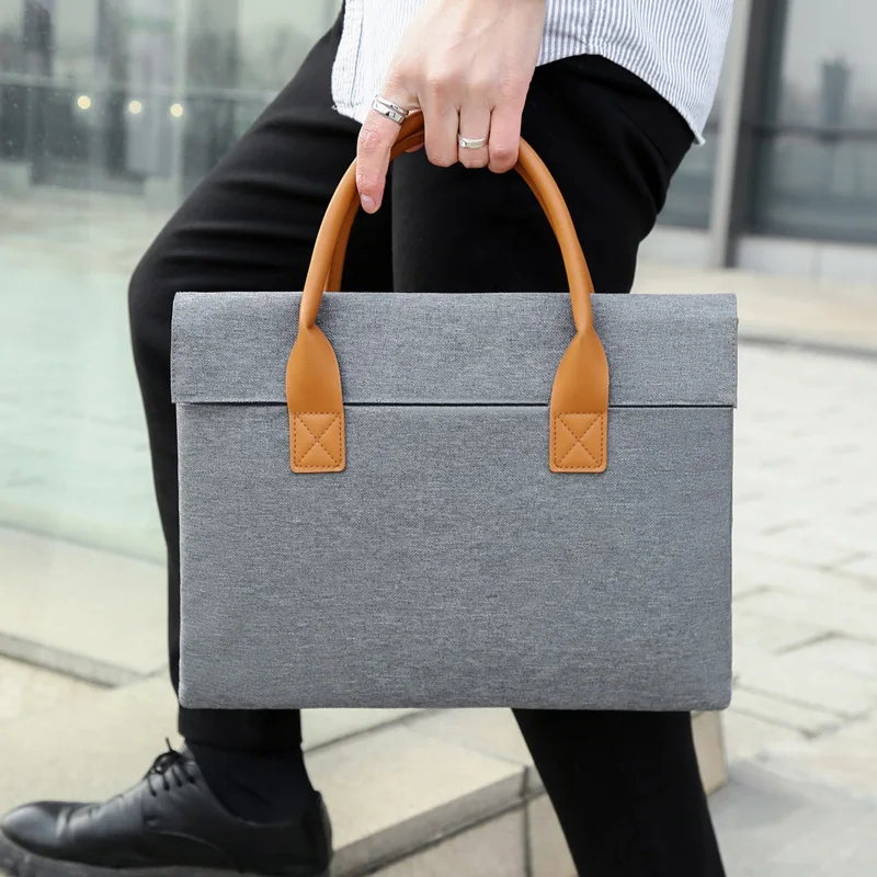 Strictly selected notebook tablet simple business commuter 16 inch computer bag portable Oxford cloth briefcase printed logo
Strictly selected notebook tablet simple business commuter 16 inch computer bag portable Oxford cloth briefcase printed logo