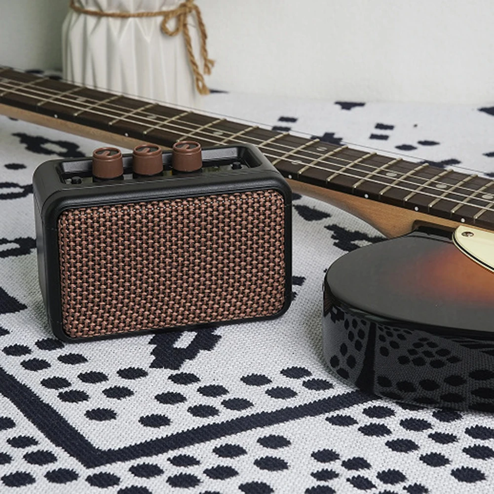 Electric Guitar Amp 5W 12.5×6.5×8.8cm Portable Playing Mini Guitar Amp For Anywhere Practice Guitars Speakers Accessories
Electric Guitar Amp 5W 12.5×6.5×8.8cm Portable Playing Mini Guitar Amp For Anywhere Practice Guitars Speakers Accessories