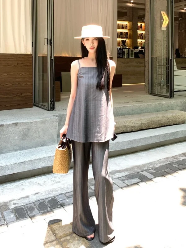 Fashionable Summer 2025 Women's Sleeveless Stripe Patterned Top And Wide Leg Pants Set Commute Style Long Pants Two Piece Set
Fashionable Summer 2025 Women's Sleeveless Stripe Patterned Top And Wide Leg Pants Set Commute Style Long Pants Two Piece Set