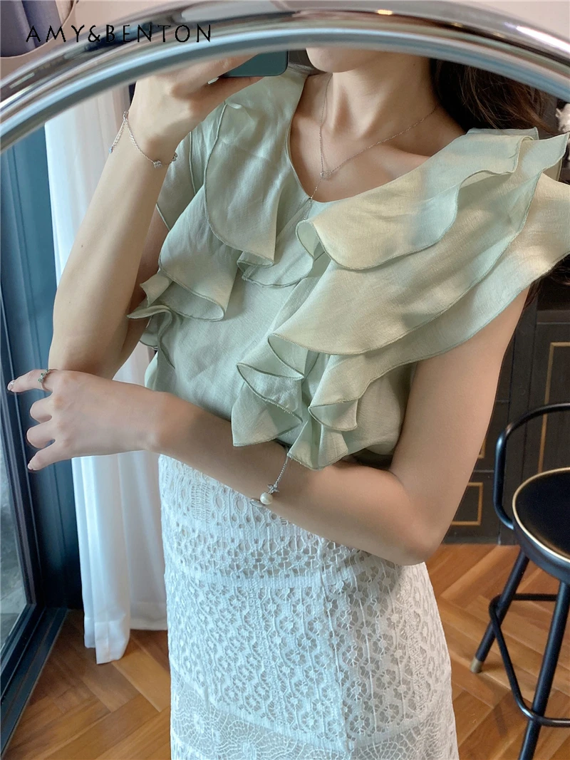 Japanese Sweet Ruffle V-neck Sleeveless Chiffon Shirt Summer New Commuter Style Solid Color Versatile Temperament Shirt Blouse
Japanese Sweet Ruffle V-neck Sleeveless Chiffon Shirt Summer New Commuter Style Solid Color Versatile Temperament Shirt Blouse