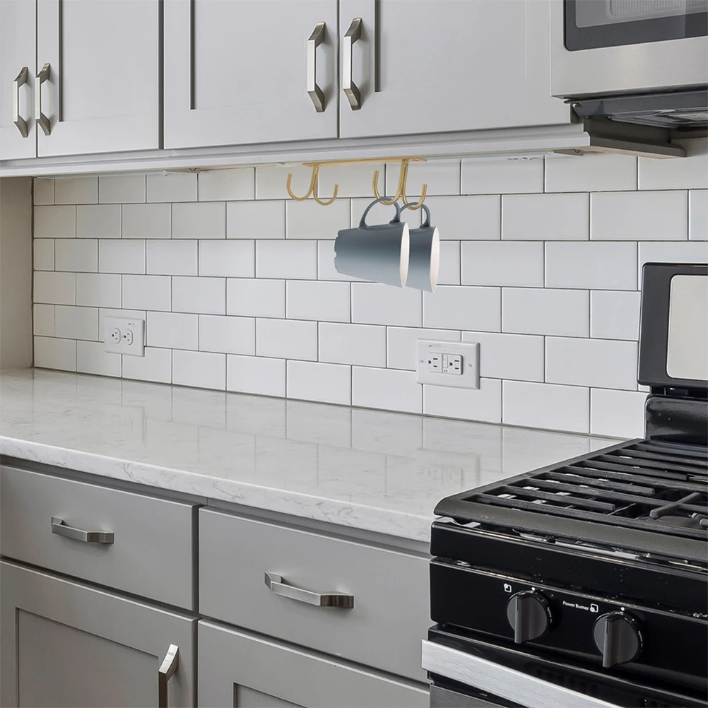 2Pcs Under Cabinet Mug Holder Iron Hanging Cup Rack Kitchen Organizer Sturdy Hooks Space Saving Coffee Cup Storage
2Pcs Under Cabinet Mug Holder Iron Hanging Cup Rack Kitchen Organizer Sturdy Hooks Space Saving Coffee Cup Storage