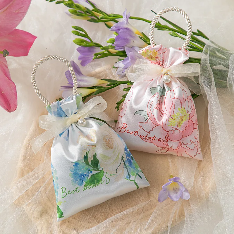 New Wedding Candy Bag Silk Pearl Pendant Gift Wrapping Bag Party Wedding Packaging Box Handheld Gift Storage Bags
New Wedding Candy Bag Silk Pearl Pendant Gift Wrapping Bag Party Wedding Packaging Box Handheld Gift Storage Bags