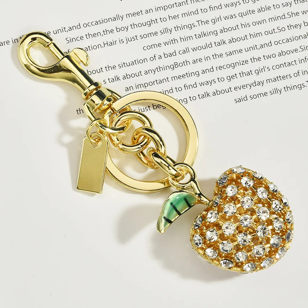 2025 Cute Fruit diamond inlaid Apple keychain, pendant, bag keychain, metal keychain
2025 Cute Fruit diamond inlaid Apple keychain, pendant, bag keychain, metal keychain