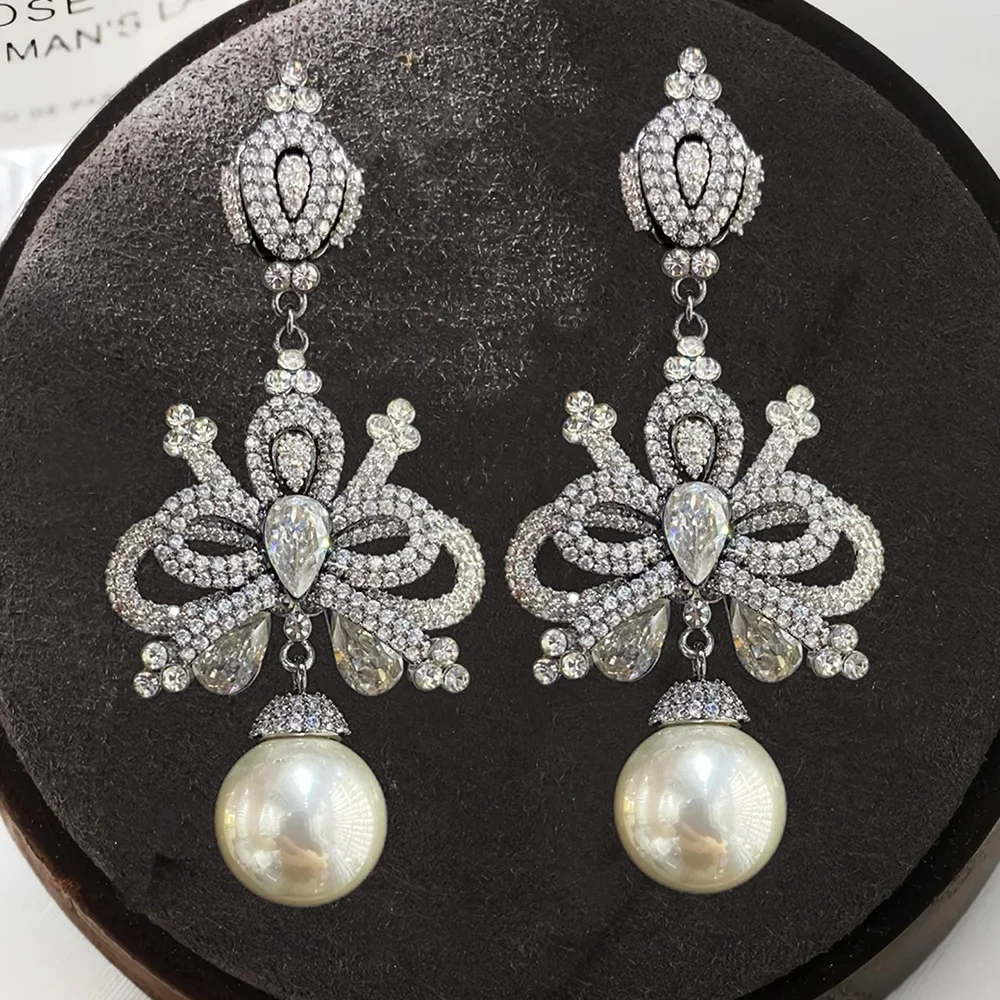 Soramoore Original Luxury Bowknot Pearl Pendant Earrings For Noble Women Wedding Party Cubic Zircon Dubai Bridal Fashion Jewelry
Soramoore Original Luxury Bowknot Pearl Pendant Earrings For Noble Women Wedding Party Cubic Zircon Dubai Bridal Fashion Jewelry